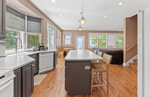 Port Sheldon House | Experience luxury at Lakefront Villa, a spacious 5-bedroom retreat - stunning lake views.