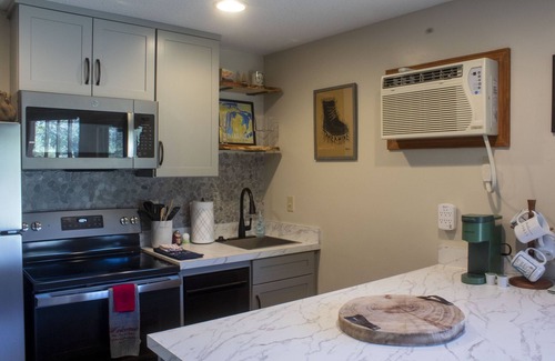Mancelona Condo | Experience Northern Michigan!Lakes pools, 1 bedroom sleeps 4. On the golf course
