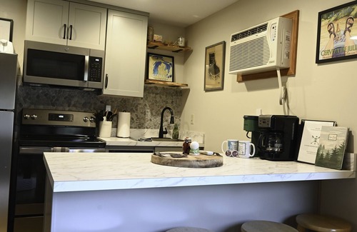 Mancelona Condo | Experience Northern Michigan!Lakes pools, 1 bedroom sleeps 4. On the golf course