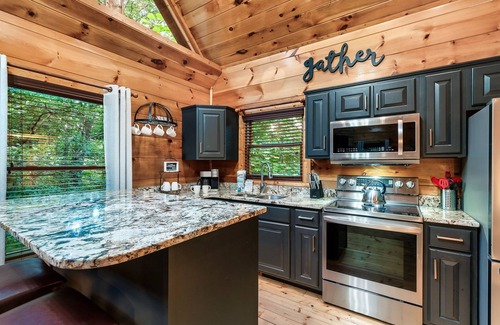 Gatlinburg - Pigeon Forge Cabin | Experience serenity near Gatlinburg 4.5 miles away, book our cozy theater cabin!