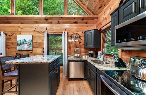 Gatlinburg - Pigeon Forge Cabin | Experience serenity near Gatlinburg 4.5 miles away, book our cozy theater cabin!