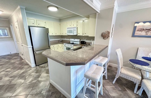 Ocean Drive Condo | Experience Tilghman Beach & Racquet 240! Second Row, Pools, Tennis, Close to Main Street!