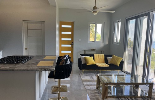 Road Town House | Experience Tranquility with Breathtaking Hillside Views overlooking Nanny Cay