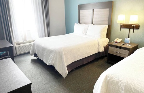West Kissimmee Hotel | Explore Disney Parks from a Spacious Room w/Complimentary Breakfast | 3 Rooms