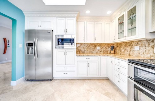 Cypress Lakes House | EXQUISITE HEATED POOL+WATERFRONT! 1 MILE TO BEACH!