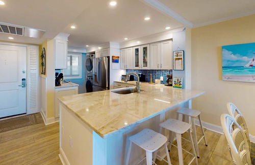 Folly Field Condo | Exquisite oceanfront top-floor condo has the feel of paradise on earth