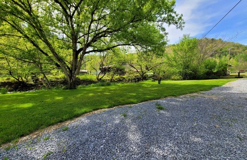 Del Rio RV Rental | Extra large grassy creekside tent site!
