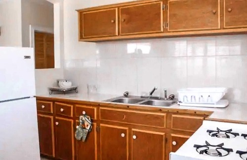 Rolleville House | Exuma Point Villas -Swimming Pigs Resort- Green Lignam Vitae