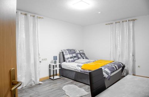 Ilsfeld Apartment | F&F Suites Ilsfeld OG, zentrale Lage, Autobahnnähe & kostenfreie Privatparkplätze