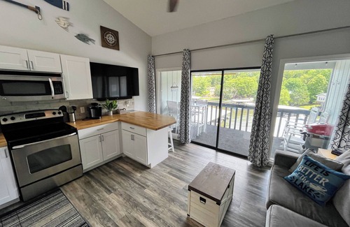 Osage Beach Condo | F Lakefront Condo Remolded Boat Slip, Patio Views, Sleeps 4, Pool, Kitchen WI-FI