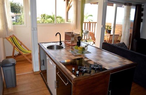 Le Carbet Apartment | F2 Panoramic view sea, mountain and swimming pool view of the residence