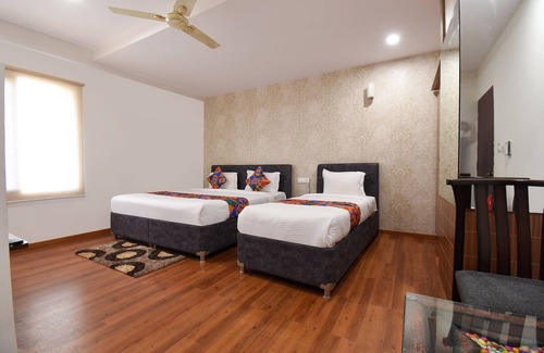 Arekere Hotel | Fabhotel Dhanvitha Suites