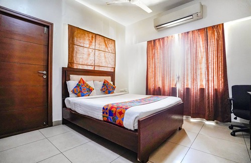 Perambur Purasavakam Hotel | FabHotel Home Tree Service Apartment