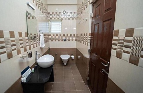 RR Nagar Hotel | Fabhotel Panchami Comforts