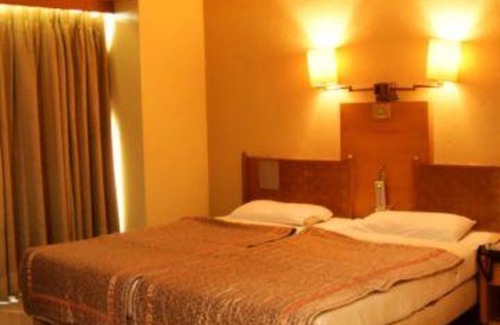 Shivajinagar Hotel | Fabhotel Prime Orchard Hospitality