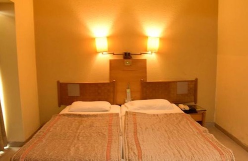Shivajinagar Hotel | Fabhotel Prime Orchard Hospitality