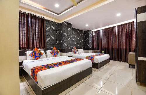 Yelahanka Hotel | FabHotel Rotano Suites - Yelahanka