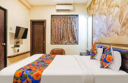 Ahmednagar Hotel | FabHotel Shades of Royal