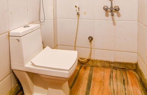Kalighat Hotel | Fabhotel The Golden Orchid
