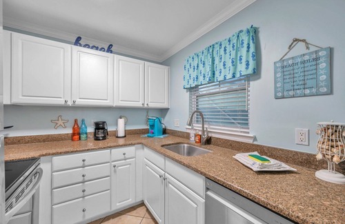 Indian Shores Condo | FABULOUS ! !DIRECT"WATERFRONT"1st FloornWalk to Beach! COZY King Bed