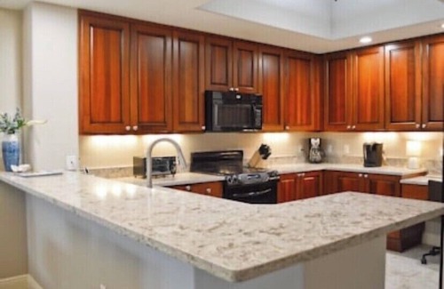 Royal Harbor Condo | Fabulous Pool Views from your Oversized Lanai