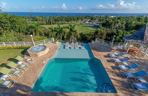 Montego Bay Villa | Fairway Manor 7-Beach Resort Membership!Tennis Court! Infinity Pool, Fully Staffed