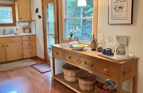 Lake Leelanau Cottage | Fall 2025 open, stunning, cozy, sunset waterfront on N Lake Leelanau.
