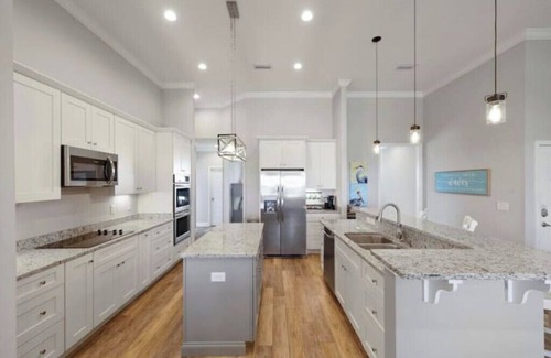 Navarre Beach House | Fall availability - Once Upon A Tide, Sleeps 15, canal, dock, luxurious home!