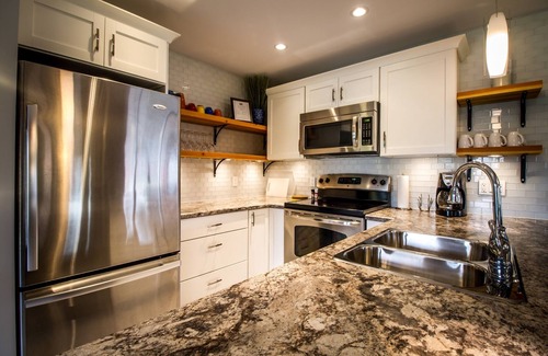 Revelstoke House | Fall Line Guesthouse | 4 Bedroom - 2 Bathroom - Hot Tub - Downtown