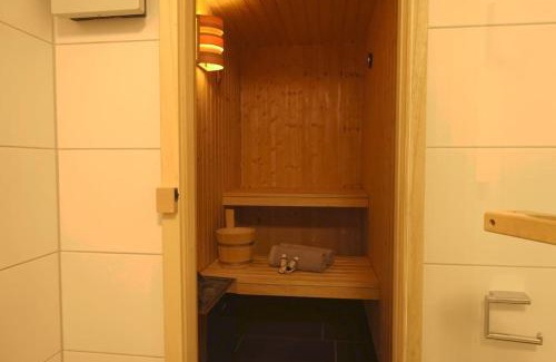 Schillig Apartment | Familienhaus an der Nordsee - Sauna - Kamin - Südterrasse direkt über dem Wasser