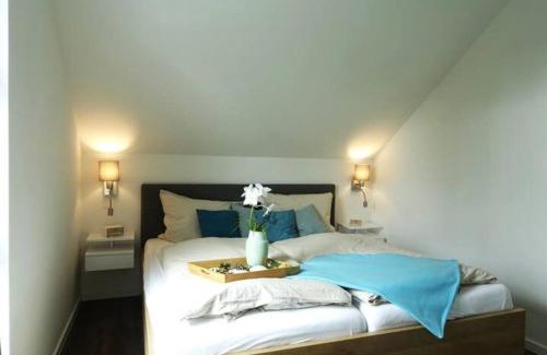 Schillig Apartment | Familienhaus an der Nordsee - Sauna - Kamin - Südterrasse direkt über dem Wasser