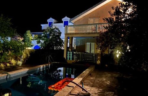 Pirovac Apartment | Family apartment with pool close to sea