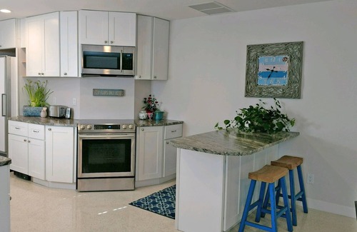 Laurel House | Family beach home! Renovated waterfront home with pool, dock, and nearby beach