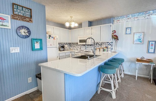 West Panama City Beach Condo | Family Friendly Condo Steps From the Beach!