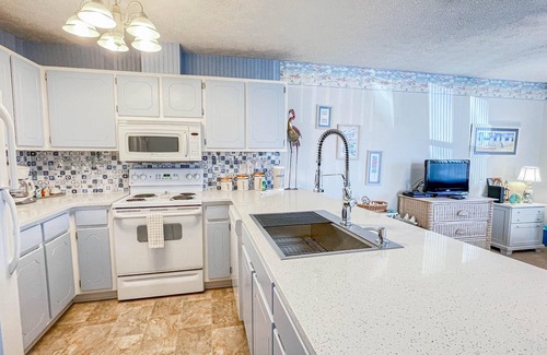 West Panama City Beach Condo | Family Friendly Condo Steps From the Beach!