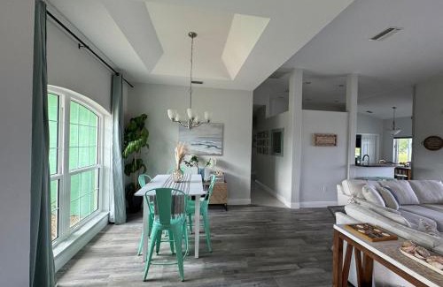 Pinehurst House | Family Friendly 3BR with Sunset Views Heated Pool Canal Front near Beach