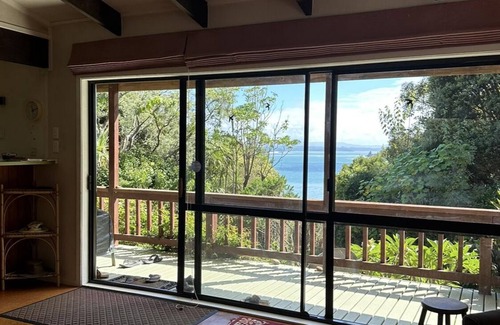 Omapere House | Family Friendly Bach n5 minutes walk to beachnPet friendly nKids rumpus room!