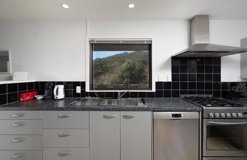Russell House | Family Friendly Beach Oasis with Modern Comforts, walk to the beach, 3 bedrooms