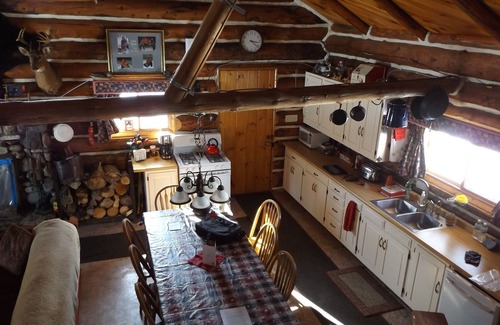 Perronville Cabin | Family friendly comfy log lodge and pond.