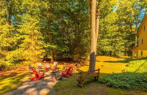 Pocono Lake House | Family friendly home away from home. Indoor hot tub. Fire pit. Game room.