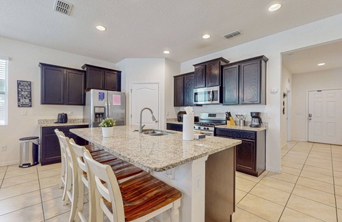 Loughman House | Family-friendly home with private pool, spa & resort lazy river/water slide