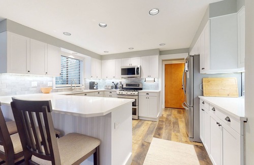 Bend House | Family-friendly home with private pool and hot tub, home theater, shuffleboard