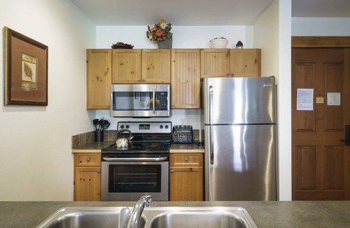 River Run Condo | Family Friendly in River Run. Heated pool & slide, steps from gondola and shops