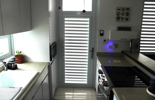 Distrito Central de Bayamon House | Family-Friendly Oasis in Gated Community, Fast Wi-Fi, Pickleball, Free Parking!