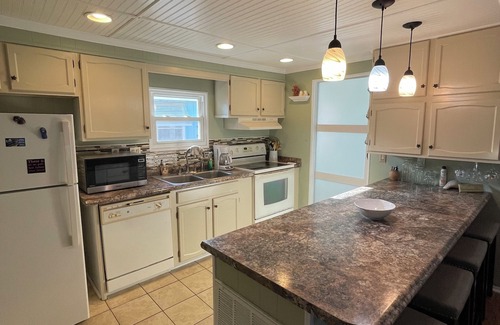 Garden City Cottage | Family-friendly Cottage minutes from the beach. Pets welcomed- additional fee.
