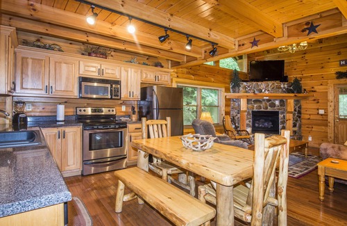 Sevierville Cabin | FAMILY FUN 2 bedroom cabin w/hot tub, fire pit only 4.5 miles from PF Parkway.