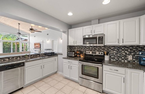 Indian Harbour Beach House | Family Fun-5B -Heated Modern Pool- Game Room - 2 Mins Beach-Short Orlando Drive