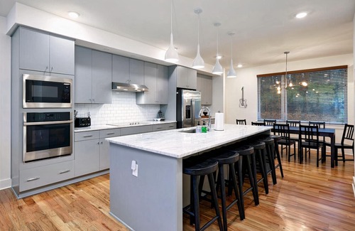 Hermitage House | Family Home Near Downtown + Airport. Includes Free Parking in Private Garage