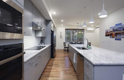 Hermitage House | Family Home Near Downtown + Airport. Includes Free Parking in Private Garage