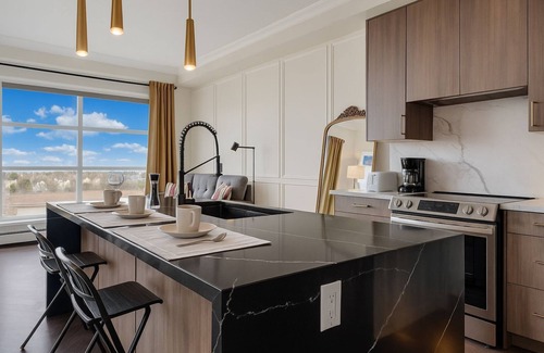 Currie Barracks Condo | Family Modern 2BR Condo with City View, DT, Balcony, F/Parking&In-Suite Laundry!